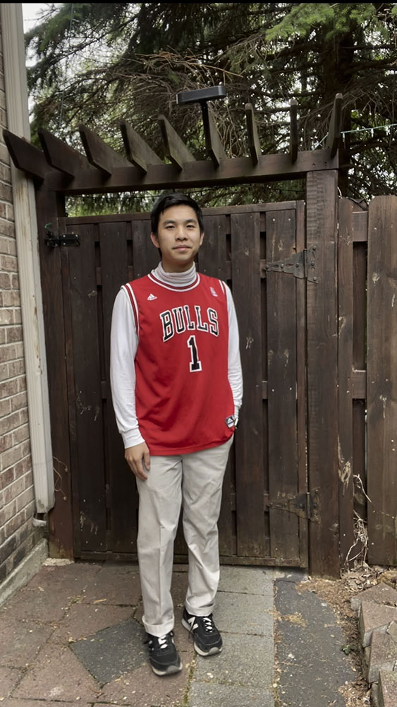 mens red basketball jersey, white turtle neck, khakis outfit